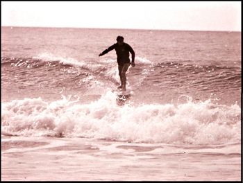 Waipu Cove ...Max Atkins!.... always amazes me these photos....how quick we used to catch the wave....i mean...he was up and surfing while it was still quite flat!....