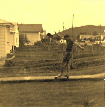and we tried to walk up and down those little skateboards!! Mike attempting a little walk...at the Kings house ...summer of '64!!...awesome fun!!!