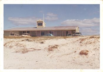 Ruakaka surfclub summer of '63 There's the 'old mans' cool chevy.....Brett Knights mini...complete with surfboard ...and pretty sure thats Dennis Sterlings Humber with the surfboard roofracks!......i think!!!!!!!!...surfing clubbies!