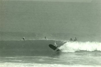 was told that this was Brett Knights girlfriend learning to surf....Waipu cove is it Judy MacInaulty?....summer of '67....maybe thats her on the left