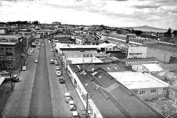 Looking north from the Broadway flyover across Newmarket towards the Auckland Museum (left background), 1965