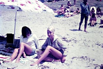 to late...they've spotted a couple!!...the unsuspecting Claire Marinkovich and friend....... the girls lap up a warm summers day at Waipu Cove 1966