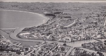 Gisborne 1952 pop. 19,000 Waikanae beach in the distance, and the home of some of the most awesome beach 'barrels' that ive ever had...summer of '68 living with 'legs' and bob hagner with barrels right out the front of our flat...'awesome'