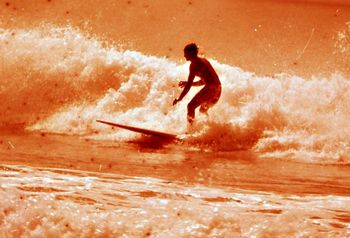 Tui at Waipu...summer of '65. With those Hawaiian flowery boardshorts on......longer boardshorts were just starting to come in!!!