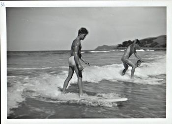 Terry Knew and Harold Watson..all concentration..Waipu ..summer of 1960.... classic photo...probably one of the first Northland surfing photos of two goofys on a wave together...awesome!...