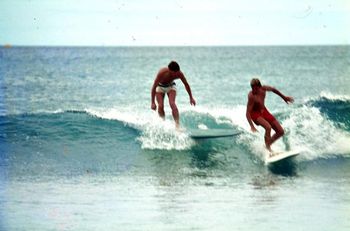 and here's Ian Butt dropping in on John Blomfield...Waipu '66 Johns signature move (in my mind) was his beautiful stylish drop-knee backhand turn...you may remember him for some other move...but he definitely was a classy surfer...no question about that!!!