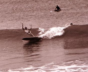what on earth is this!!! a reverse switch foot twist backhand reverse whatchamacallit!!.......Who? anyone know!!...great advocate photo..Waipu '63