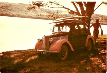 overloaded woody in New Zealand in '66...... Jim Nash and his trusty old Austin...we would face one headlight straight ahead and the other down to the ground..Haaa!!...