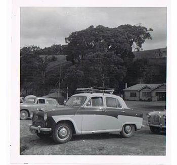 Terry Knews Austin Waipu Cove 1960....They rocked up in their 'woody' ....a 1955 Austin A50....im'e pretty sure Brett Knight had one of these cars as well!....great little cars....column gear change if i remember rightly!....surfers all over NZ were about to bring alive some of these old classic surf wagons.......