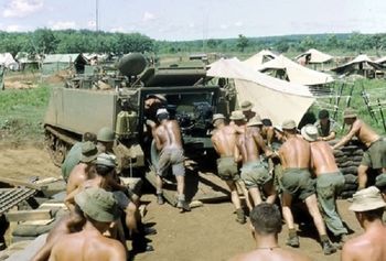 but also how mildly concerned we were at the news that NZ was becoming involved in Vietnam ....The 161st Battery of the RNZArmy load an L5 Howitzer on to a M113 Armoured Personal Carrier on the shores of Indochina ...1965