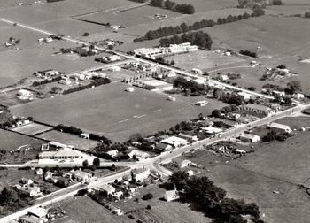 Waipu (Northland) 1953 ...if you lived in a rural area of NZ.... you probably lived in a town similar to this.... thats our old Waipu primary school in the background..Waipu pub in the forground...pubs closed at 6pm..remember!!