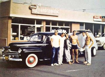 1958 Joel Babe Craig, Sonny Vardema George Kapoo, Bing Copeland, Roy Bream & Rick Stoner on 22nd Street Hermosa Beach. Valdeman is loaded up for a trip in 47 Ford.