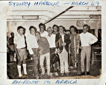 from the left..John Blair...Lee Willoughby...Legs at back ..and Bob Hagner holding bag... Off to Africa...march '69
