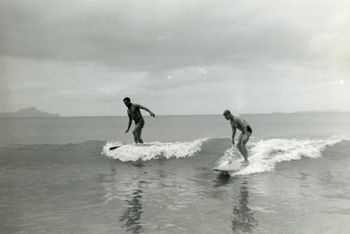 Ross and Tui Waipu Cove '61 (Ross Edge & Tui Wordley...couple of Northlands surfing fathers)... this is one of those rare times when Tui was outshone by someone else. Im'e pretty sure Ross was saying something like: "whats the matter Wordley..do you want me to show you how to surf..ha!!"To be fair though..Tui had only been surfing a couple of months