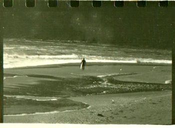 This shot of Colin walking up the beach at Pataua 1973...... typifies the whole change in attitude towards surfing...in '63 it was all about catching a wave with your mates...in '73 it was all about 'my' wave. Peter Drouyn's 'man on man' competiton was only 4 yrs away......the old innocence was gone forever!!!