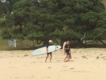 Surfing together 45 years....John and Mary Ralph...how cool!!..Paradise Bay 2014 Mary had to pass up her surfboard a number of years back...and raising a family of five kids (all grown up now) is pretty special.....so cool guys...amazing!!