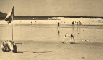 Ruakaka 1963...low tide and a quite a nice sized swell running ...we would have been surfing that swell out in front of the clubhouse at first light when it was glassy this same day...was awesome fun!! probably Brett, Mike King, myself and Wayne Hutton.......most surfclubs around NZ had the early morning malibu crew!