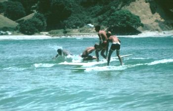 surfing the corner of Langs...summer of '65 Ross paddling out...maybe Tui and Dak!!!....not sure about the small guy on this side!!