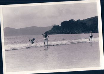 Waipu Cove summer of '63 The lovable 'Billy Prichard' having fun on a 6" wave...Peter Delarue going the wrong way!!! Billy was probably the first person that i ever saw wearing a kind-of wetsuit vest..was very loose and sloppy with no sleeves i remember!!
