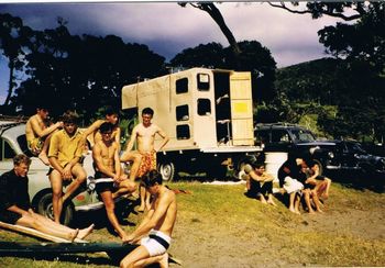 The crew hangin out at Sandy bay ...summer of '66..(from left) Drew Campi John Ivey Tom Milligan Craig Rice Laurie..Mark Tate(standing)..Ian Butt..Bill Player..Tony Kivell..Gary Orevich Derek Brott with Lauries green morris & 'Clive' the truck..everyone looking very excited this day..must have been 1ft onshore!..ha!