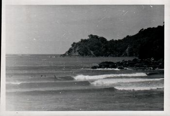 a nice mellow day on the bar... 'Legs'..Mike Cooney..Bob Hagner..and Wayne charlton enjoying a classic summer wave on the Pataua bar...summer of '68