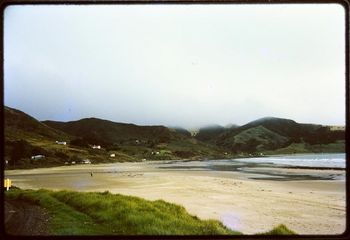 Ahipara 1960..pretty quiet looking place( the further we go back in time) ..still metal road as you see on the left...