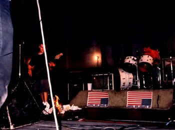 Live @ the Capitol Theater (on the main stage), May 2nd, 1992. #4 After being tossed into the crowd and torn to pieces... remnants of the cop effigy we'd made the night before were set on fire and thrown back on stage!