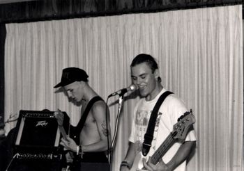 Band practice, Saginaw, Michigan, July, 1991. Our temporary practice space @ the Boyle residence. We were forced to leave our original practice space after too many complaints, noise tickets, visits from pissed off neighbors, the police, and a local preacher trying to save our souls. Photo by and courtesy of Ma Boyle.