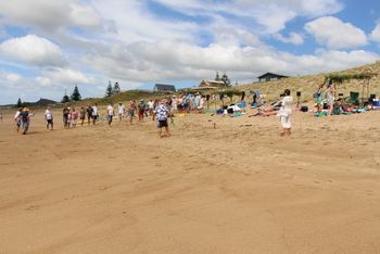 233 this is a competitive game we used to play in the surfclubs...we would compete against other clubs...its called 'musical flags'...