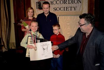Joe Recchia welcoming and awarding newest Youth member of Michigan Accordion Society Fantatisc Player and Performer 9 year old Lukas Stachurski and his wonderful and Supportive family!