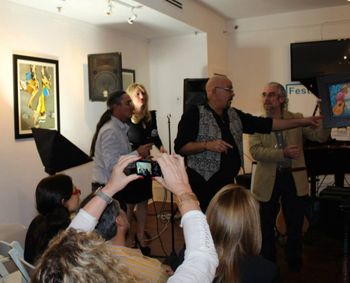 JovenajeDec 14.2014 Photograpeher Delio Regueral, journalist Karen Caballero & painter Casimiro Glez delivering his gift