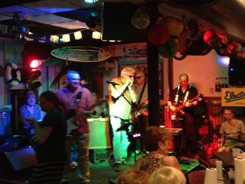 IMG_6309 The Electras rocking the River Grill. That's Doug "Shakey Leg" Thornton in the spotlight. Doug's sweet & scathing harmonica can be heard on Bob's new album. Check out the Links page, as well.