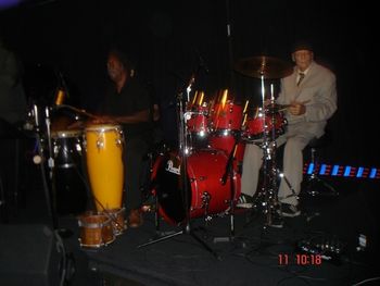 Steven McGill - Congas, Gene Stone - Drums, Gary Lenk Bass You can hardly see Gary but if you look real close... This is @ Vitello's 9/11/2014 WaterColours Reunion in a benefit for Gene