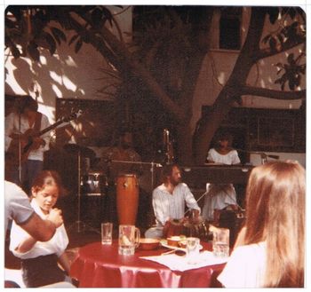 Mandala I am not sure of the year, but we were at the Comeback Inn in Venice Beach,California Roshon Kumar on Guitar Steven McGill on Conga Drums, Dennis Bowman on Tablas and Shivani Kumar on Piano and vocals.