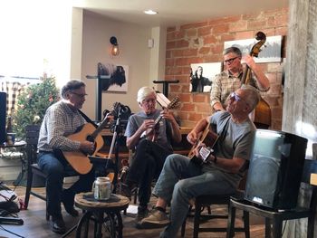 Soul Squared Brewing Company - Playing upright bass with The Nebraska Boys bluegrass group at Soul Squared Brewing Company (Photo by Grace Cross)