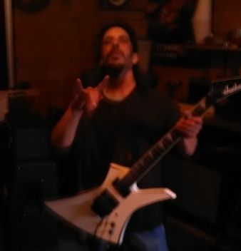 AxeToGrindChrisNormandin www.axetogrindmusic.com