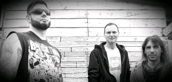 AXE TO GRIND (LtoR) BrianMartens, JMotto, Chris Normandin www.axetogrindmusic.com