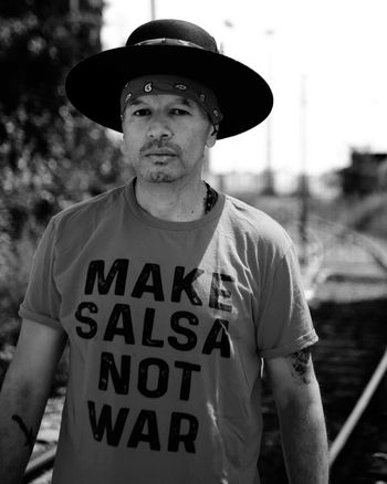 Prophet aka Not4Prophet is a soul singer/punkrock slinger/sub-verses sonero, alter-native agitator, anarcho-independentista and the voice and vision(ary) front(line)man for the almighty Abrazos Army.