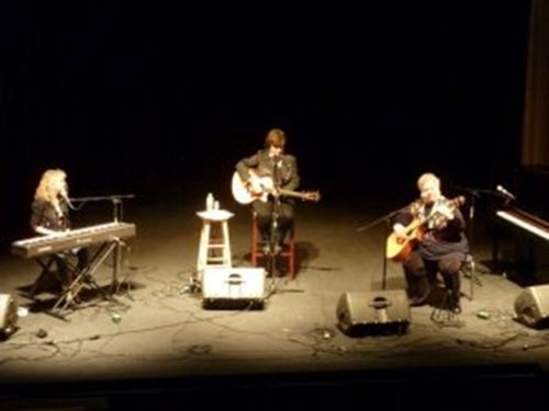 on a theater stage with Becky Hobbs and Ann Rabson