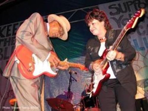 at a festival with Hubert Sumlin