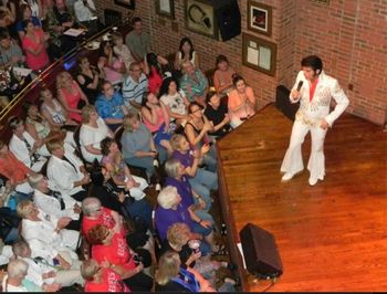 Performing at the Hard Rock Cafe Last Chance Elvis competition. Aug 12th 2012. This was alot of fun ,but the guy who announced me got my last name wrong. Called me Richie Santana. To bad my brother Carlos couldn't be there lol