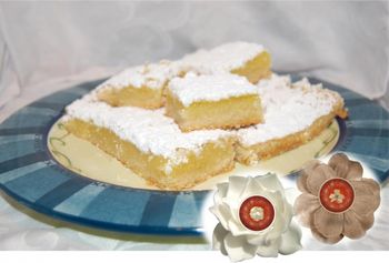 Lemon Squares Tangy ans sweet lemon squares made with fresh squeezed lemon and the zest and a flakey buttery crust.