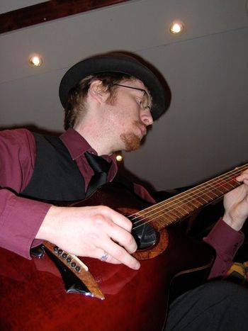 Here I am playing a Redemption guitar made for me by Daniel Kuppels out of Germany. www.redemption-guitars.de