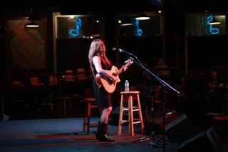 Lynn enjoys the BW Stevenson Memorial Singer-Songwriter semi-finals night at Poor David's Pub in Dallas with 11 other fine songwriters.