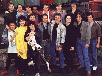 From the "J.A.M. '86" charity record, "We've Got The Love." E Street Band members Garry Tallent (3rd from right) co-produced, and Max Weinberg (2nd from right) played drums.