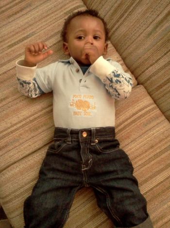 POCO PERRO aka JACRYS wearing BABY SOUL light blue polo style shirt with gold metallic soulfull logo(2012).