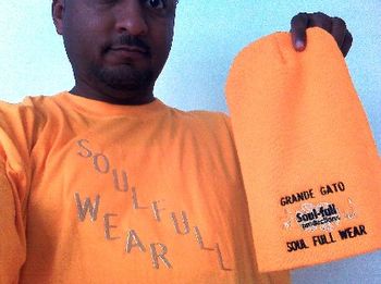 J.O.T. aka GRANDE GATO with YELLOW SOULFULL WEAR T shirt with metallic writing & yellow SOUL-FULL WEAR toboggan with metallic writing
