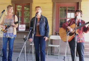 Women on the Move Trio (Linda Geleris, Trish Lester, Joan Enguita) perform on the Railroad Stage in the first round of Singing Competition at the 51st Topanga Banjo/Fiddle Contest & Folk Festival