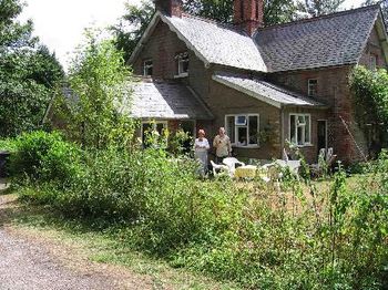 No, Andy wasn't there when we got there. This picture was taken later by Tom coming back from a run, but it also shows the house and Ian's Mum to whom we also owe our thanks!