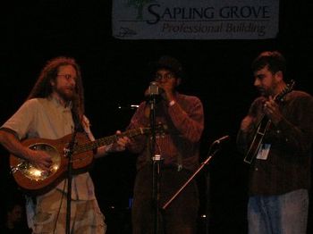Ras Alan, Dom Flemons (Carolina Chocolate Drops) and Mike Guggino (Steep Canyon Rangers) perform "Appalachian Man" at the Bristol Rhythm and Roots midnight SuperJam in the Paramount Theatre, Bristol